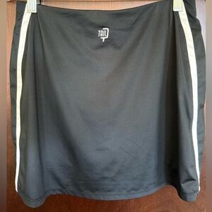 New (but hand washed) Tail skort in black w double strips on each side

Small